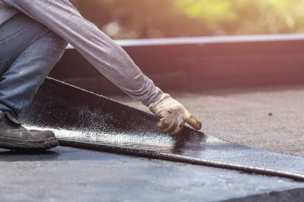Professional Waterproofing technician working in Osceola, WI